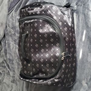 💎Paris Hilton Wheeled Duffel bag in black  and white, hot pink inside.